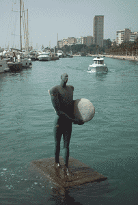 Statue in harbour at          Alicante