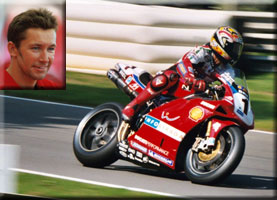Troy Bayliss Ducati 2001 WSB          champion, or is it? The bike has the number 1 on it, but the          helmet design looks like Reuben Xaus - confused!